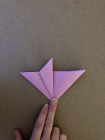 Step 6 12 petal kusudama: Fold left flap to middle