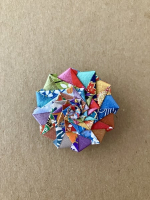 Step 1 double pinwheel mandala: Complete the front of the starfish mandala on both sides to create this model.