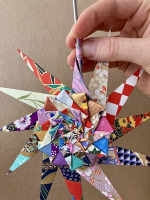 Step 17 starfish mandala: Curl the outer points.