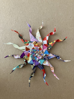 Step 18 starfish mandala: The outer points curled.