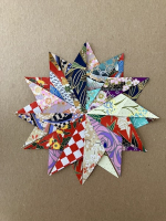 Step 4 starfish mandala: The fanned paper.