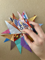 Step 7 starfish mandala: Fold the edge of one point inwards.