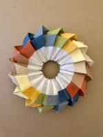 Step 13 16 piece modular pinwheel: Interlock all 16 units.