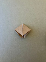 Step 3 16 piece modular pinwheel: Make a square-shaped water bomb base, two layers thick.