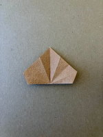 Step 7 16 piece modular pinwheel: Flatten out the model.