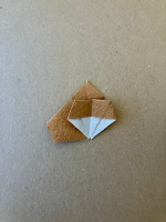 Step 8 16 piece modular pinwheel: Swing the right flap open.